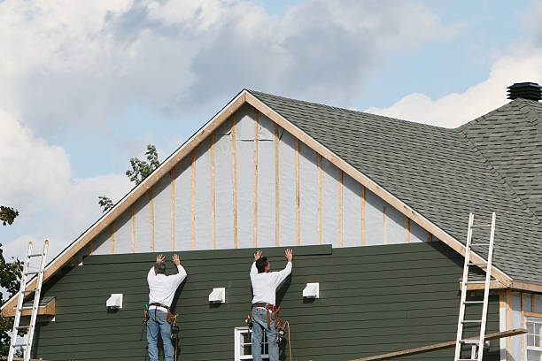 Professional Storm Damage Siding Repair technician working in West Springfield, PA